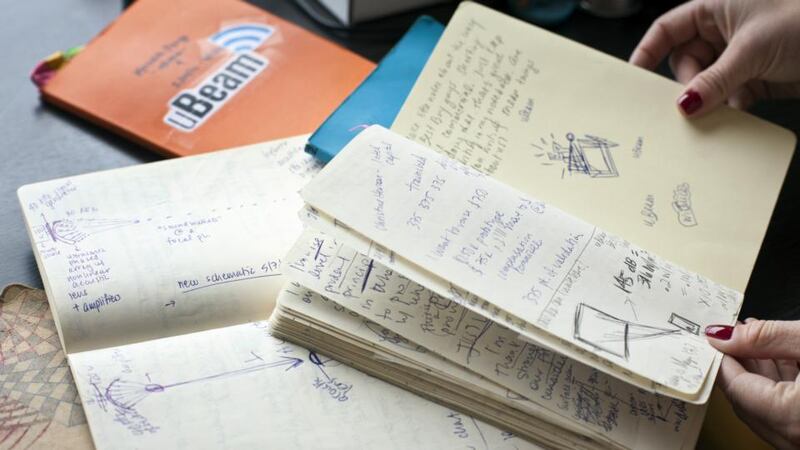 Meredith Perry’s notebooks in which she recorded ideas and trials during the development of her uBeam device. Photograph: Peter DaSilva/The New York Times
