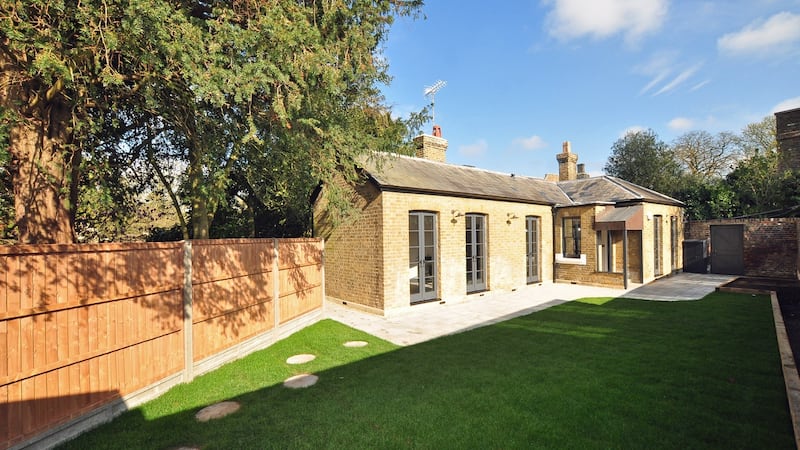 Outhouse on Kew Gardens estate which has been sensitively modernised to bring in rental money for heritage