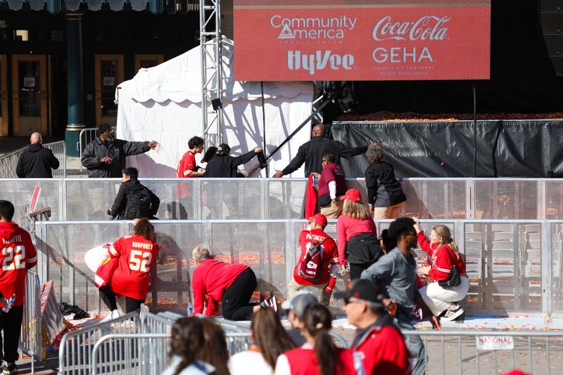 People take cover during the shooting. Photograph: Jamie Squire/Getty