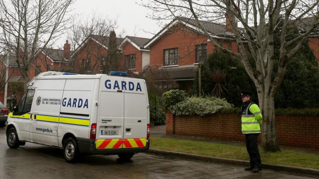 Members of the Garda outside the home of Alan Shatter in Dublin last week. Photograph: Brian Lawless/PA Wire