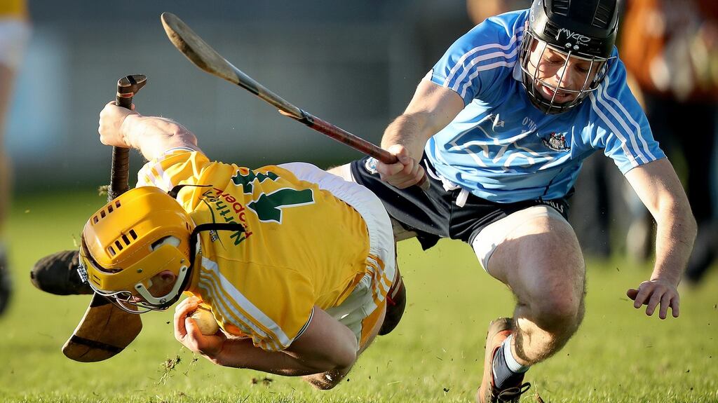 Dublin’s Ronan Smith tackles Connor McCann of Antrim. Photograph: Oisin Keniry/Inpho