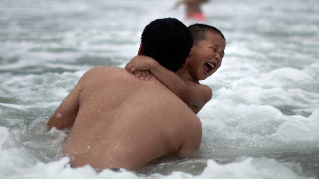 People cool off in the Pacific ocean during the heat wave in Santa Monica, California. Photograph: Reuters