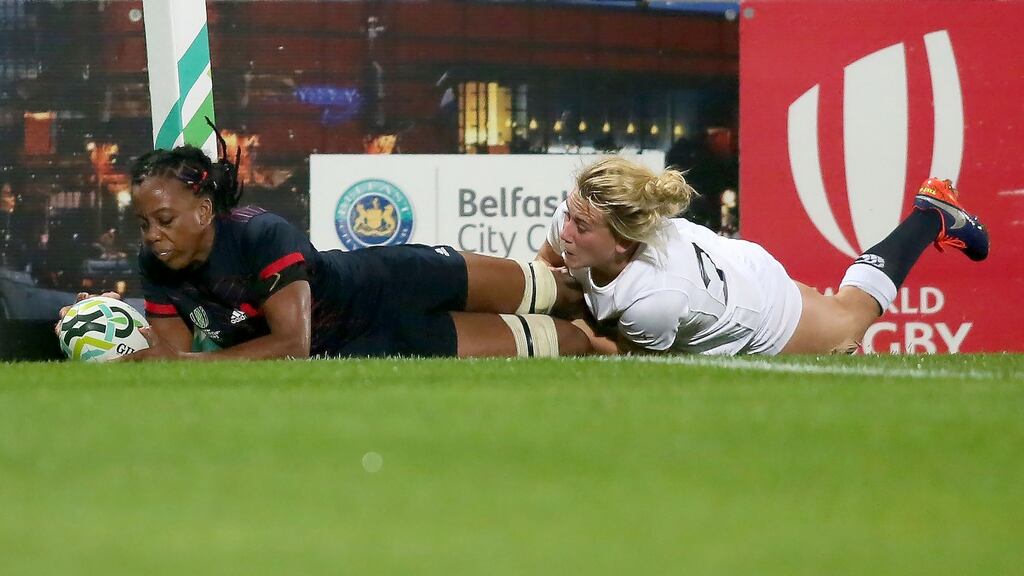 France’s Julie Annery is tackled by England’s Sarah Bern. Annery crosses the line but the try is disallowed. Photograph: Getty Images