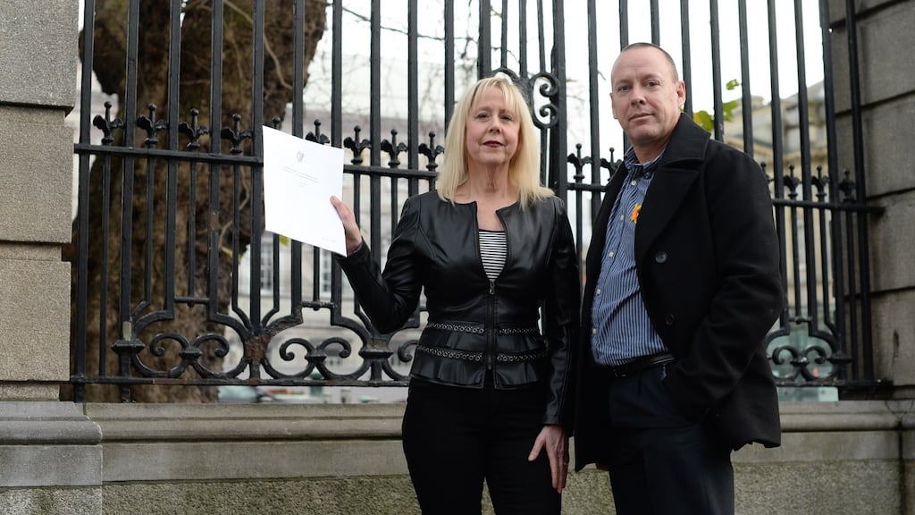 Eileen O’Sullivan and Ramon Whelan outside Leinster House on Wednesday after the launch of new legislation to crack down on advertising of false cancer cures. Photograph: Dara Mac Dónaill