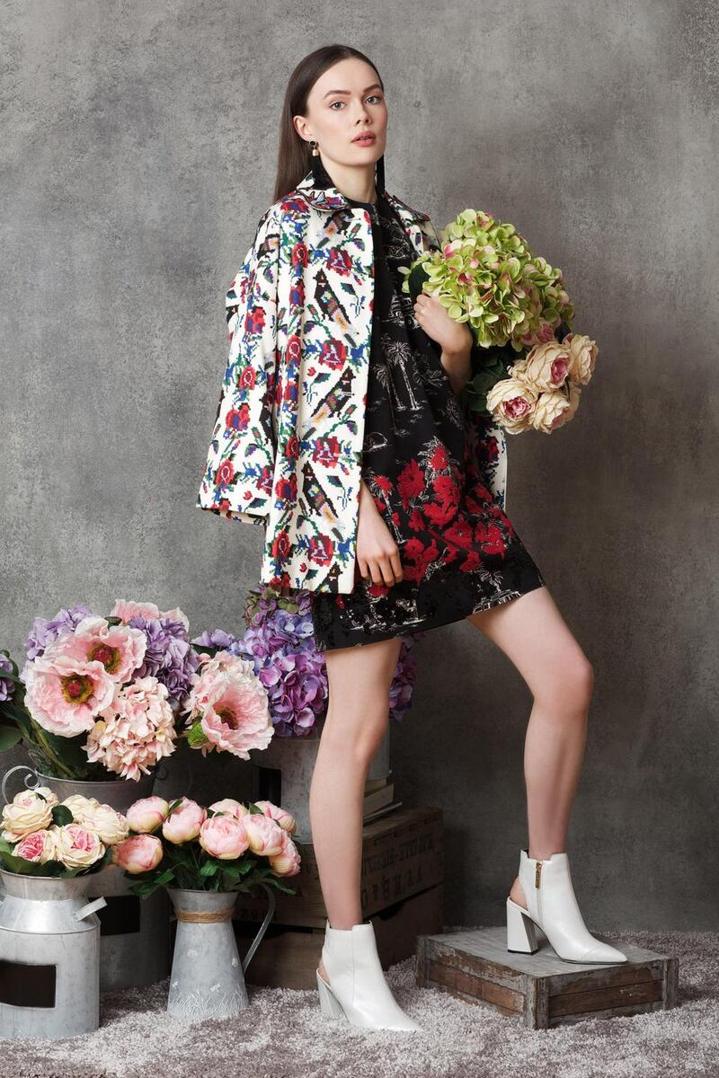 Coat €810 Red Valentino, dress €950 No 21, Brown Thomas, boots €80, earrings €13 both River Island.