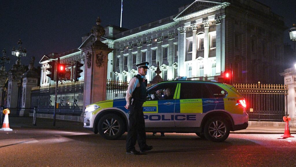 Three police officers were injured after tackling a man who drove a blue Toyota Prius at a marked police vehicle outside Buckingham Palace (above) in London on Friday night. Photograph: GOR/Getty Images