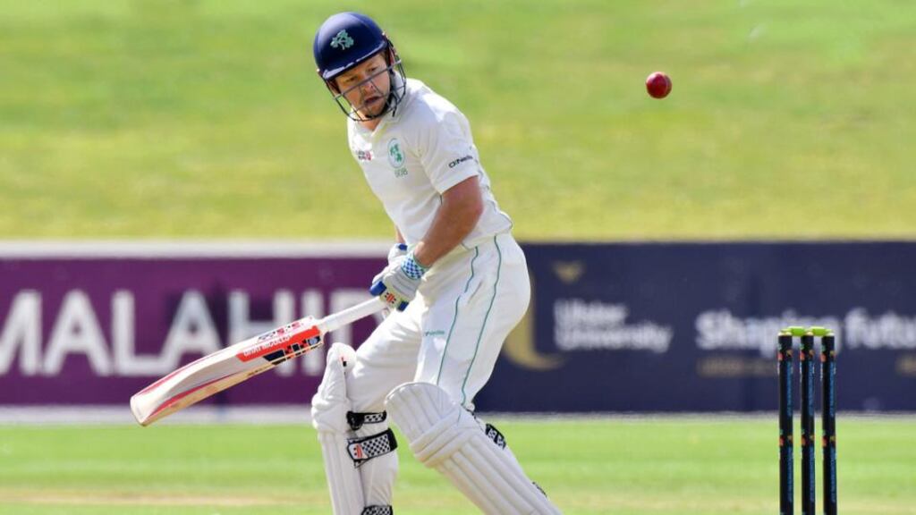 Ed Joyce keeps an eye in case the ball hits the stumps. Photograph: Rowland White/Inpho/Presseye