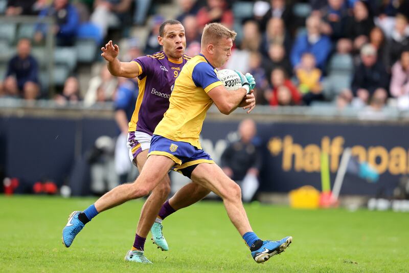 Kilmacud Crokes' Craig Dias in action against Na Fianna's Jonny Cooper. Photograph: Bryan Keane/Inpho