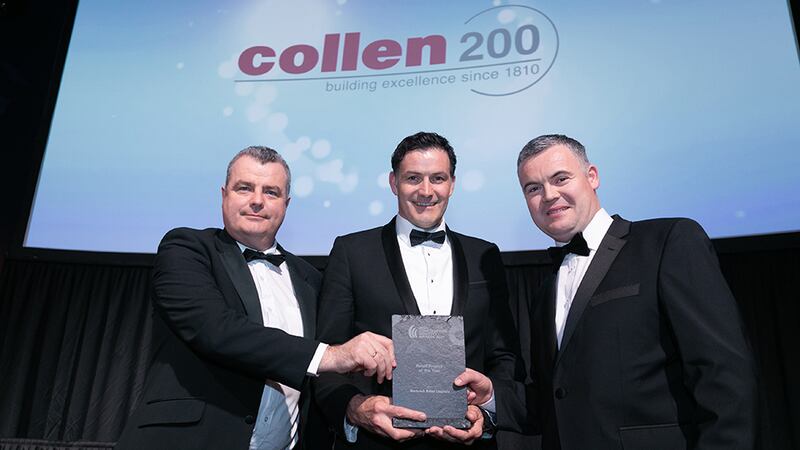 Andrew Howley, Awards Judge, presents Retail Project of the Year award to Donal Hennessy & Liam Flynn, Collen Construction.