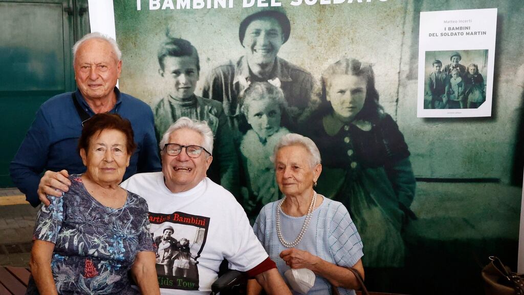 American former soldier Martin Adler (2-R) meets with Bruno, Mafalda and Giuliana Naldi after nearly killing them near the Emilian capital in 1944, in Bologna, Italy. Photograph: Elisabetta Baracchi/EPA