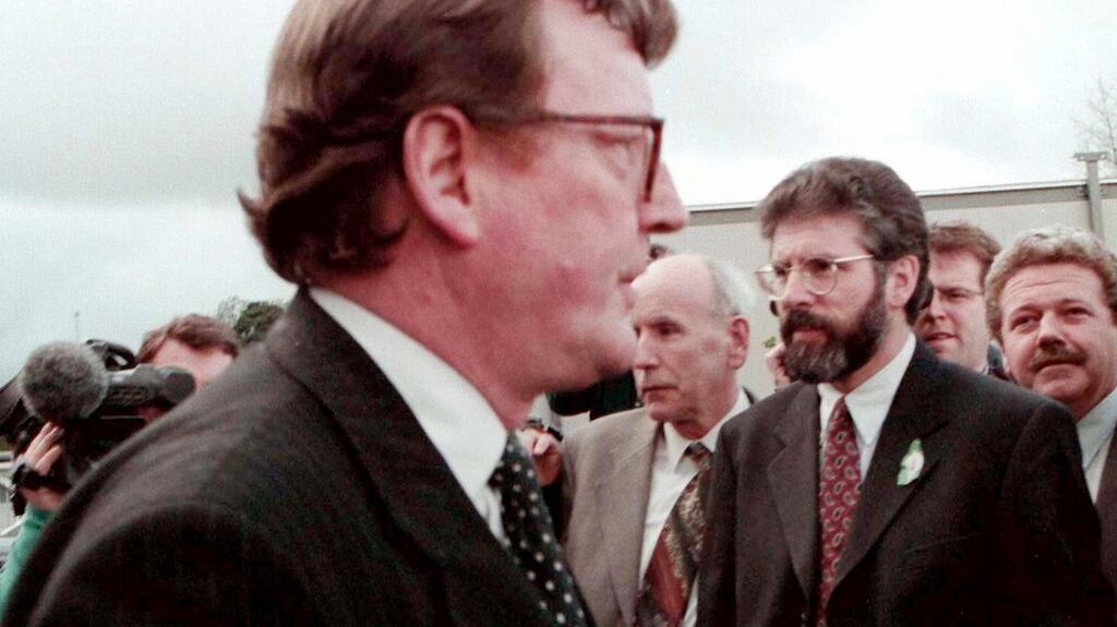 Then Ulster Unionist Party leader David Trimble and then Sinn Féin president Gerry Adams pass within touching distance of each other outside Castle Buildings, Stormont, during a break in the negotiations before the signing of the Belfast Agreement on April 10th, 1998. File photograph: PA