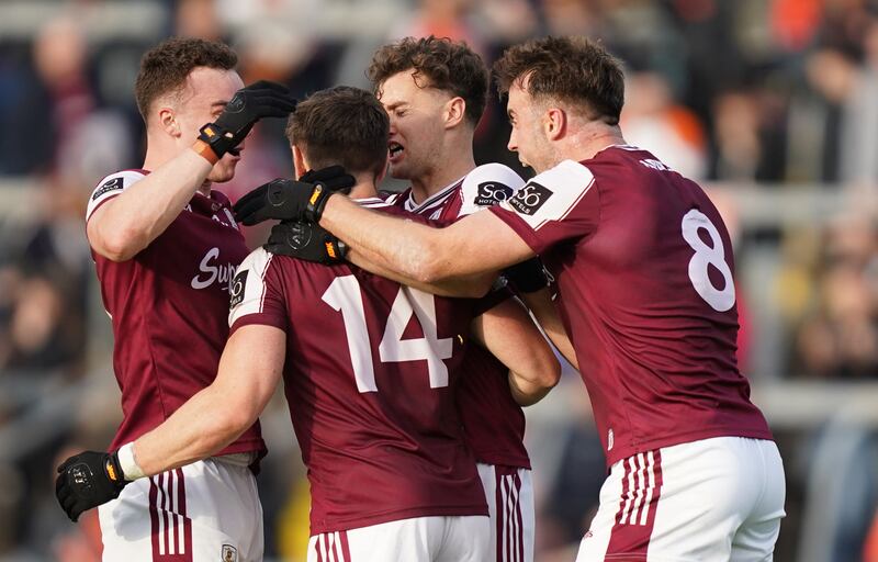Shane Walsh of Galway is congratulated by teammates after the Tribesmen's come-from-behind victory against Armagh at Kingspan Breffni Park.
Photograph: James Lawlor/Inpho