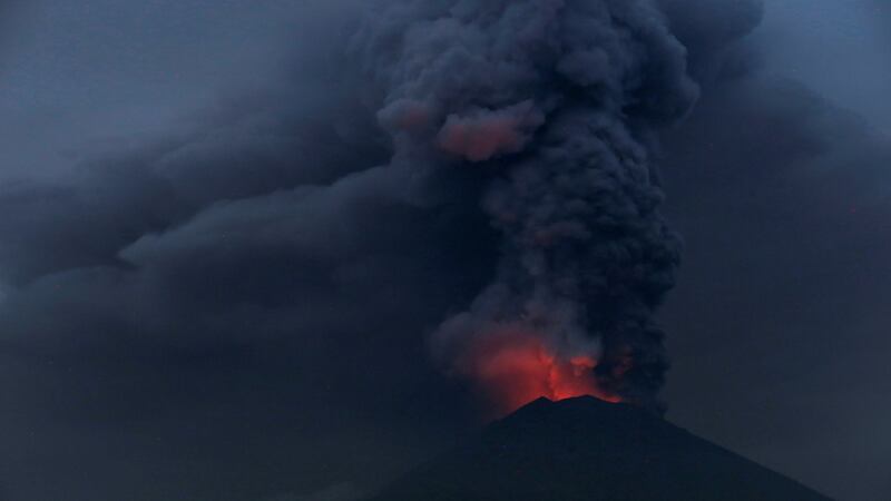 Glowing light from hot lava is seen during the eruption of Mount Agung on Monday. Photograph: Reuters