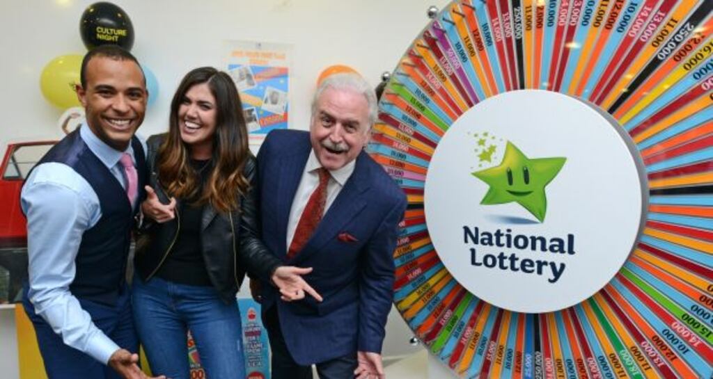 Marty Whelan and two members of the public when the National Lottery made its props available for Culture Night. Photograph: Dave Meehan