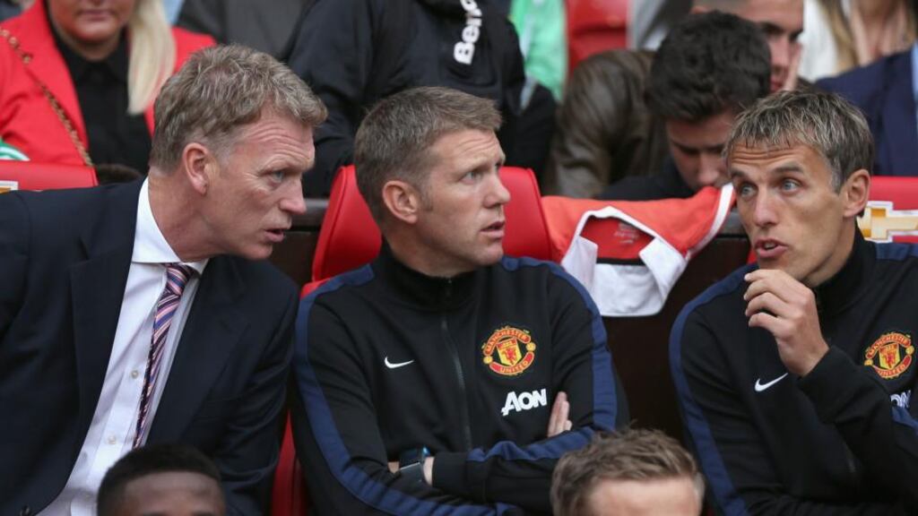 United manager David Moyes with Steve Round and Phil Neville: the new manager has already shown himself to be his own man.