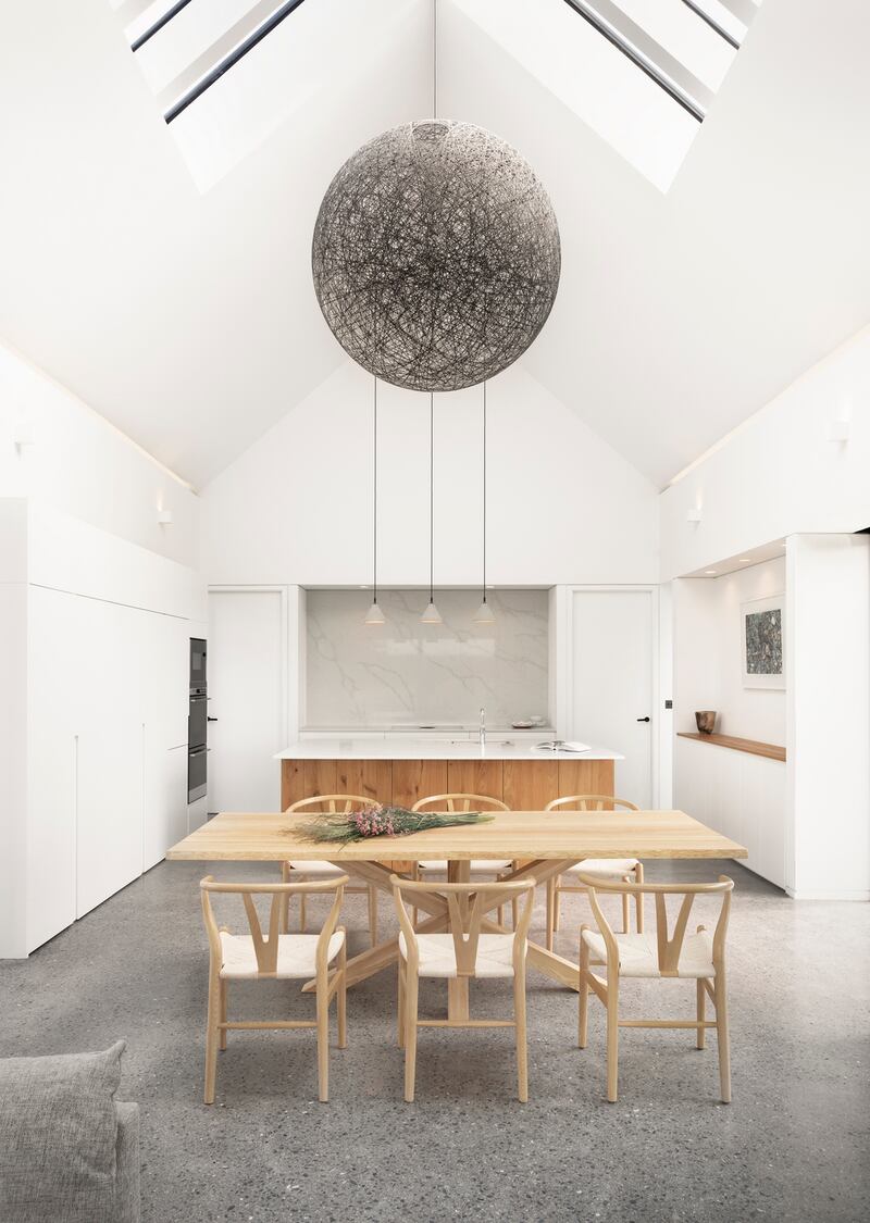 The open-plan kitchen, dining room.