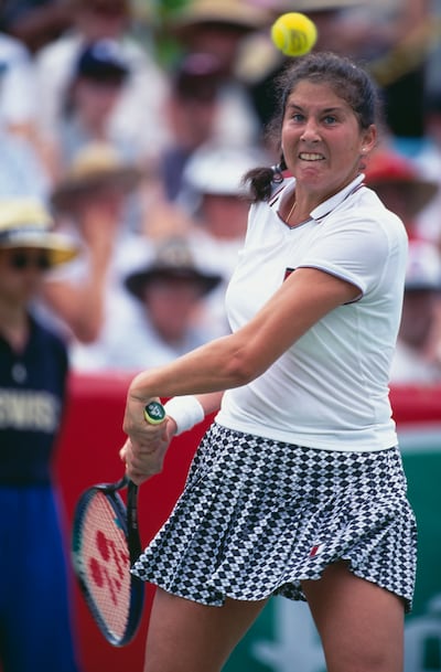 Monica Seles in action during the 1996 Australian Open final against Lindsay Davenport, her sole Grand Slam win after returning from a 1993 stabbing attack. Photograph: Clive Brunskill/Getty Images