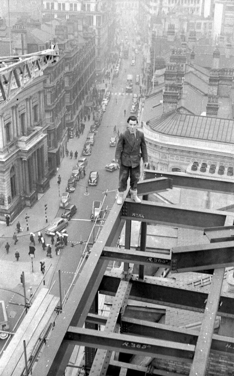 The late Fabian Cowan’s photograph of an Irish builder working without safety harness on the construction of a building in Birmingham city centre. Photograph courtesy of the Cowan family