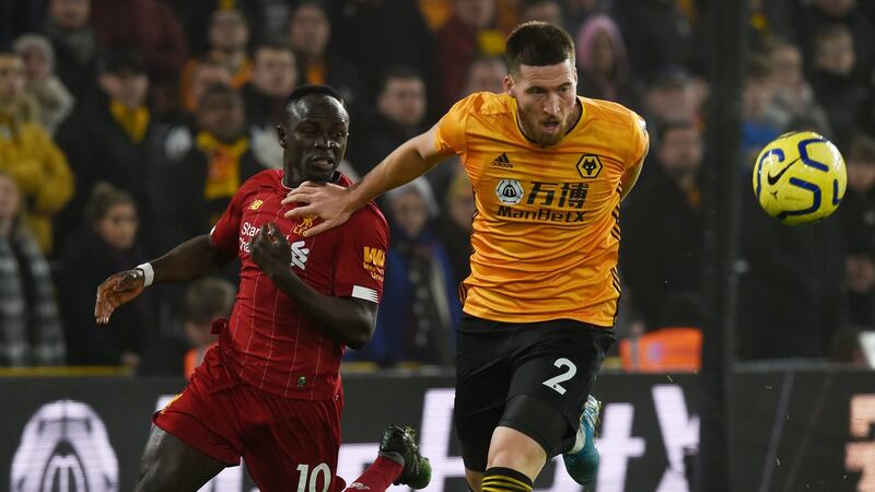 Wolves’ Matt Doherty holds off the challenge of Liverpool’s  Sadio Mane during the Premier League match at Molineux back in January. Photograph: John Powell/Liverpool FC via Getty Images
