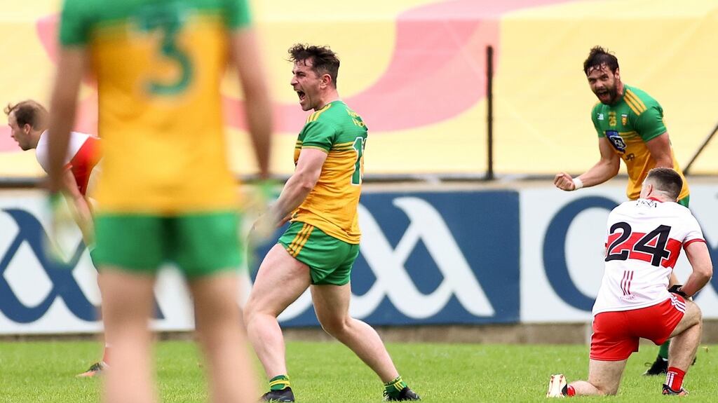 Donegal’s Patrick McBrearty celebrates his winning point alongside Odhran Mac Niallais. Photograph: James Crombie/Inpho