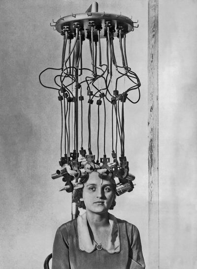 A model having her hair permed by a permanent wave machine in London, 1928. Photograph: Henry Miller News Picture Service/ Archive Photos/ Getty Images