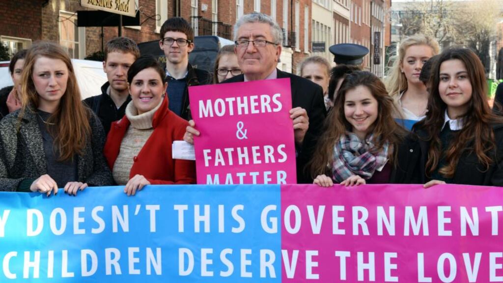 Prof Ray Kinsella (centre) at a photocall organised by the group Mothers and Fathers Matter outside Leinster House, Dublin. Photograph: Eric Luke/The Irish Times