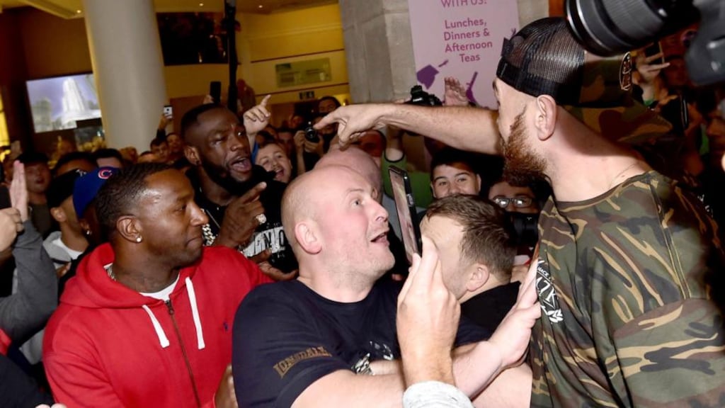 Tyson Fury and Deontay Wilder in an exchange in the Europa Hotel in Belfast during Fury’s weigh-in for his fight against Germany’s Francesco Pianeta. Photograph: Stephen Hamilton/Inpho