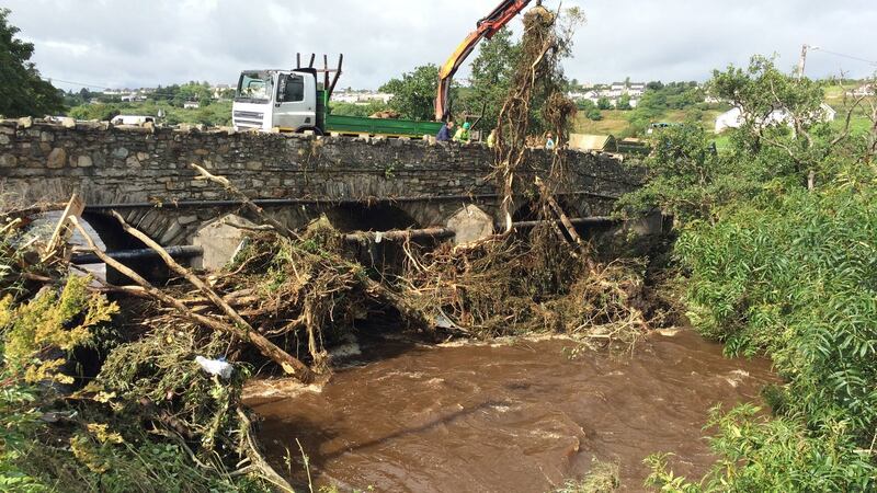 The clean-up which got under way at Cockhill Bridge in Buncrana, Co Donegal. Photograph: Brian Hutton/PA Wire