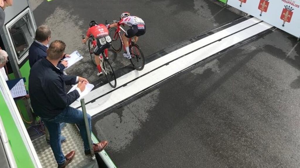 Belgian Tim Wellens (Lotto Soudal)  crosses the line just ahead of  Swiss rider Marc Hirschi. Photograph: BinckBank Tour