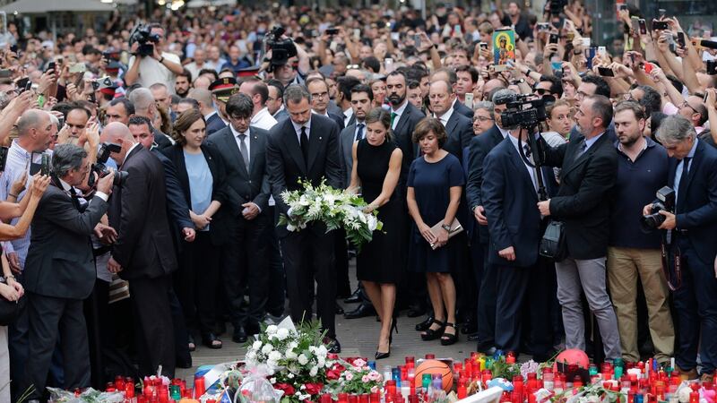 Spain’s King Felipe, Queen Letizia lay a wreath of flowers at a memorial tribute of flowers, messages and candles to the van attack victims in Las Ramblas promenade, Barcelona, Spain, Saturday, August 19th, 2017. Photograph: AP /Emilio Morenatti