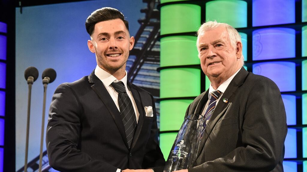 Brighton and Hove Albion’s Richie Towell is presented with the SSE Airtricity League Player of the Year by FAI President Tony Fitzgerald. Photograph: David Maher/Sportsfile
