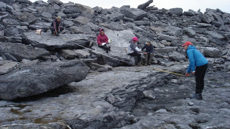 Students measuring the boulders on the Aran Islands. Photograph: Prof Rónadh Cox