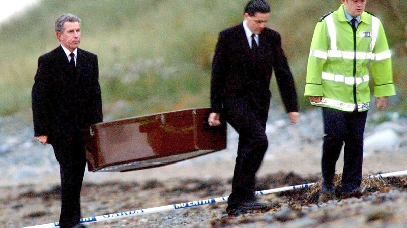 The body of Provisional IRA murder victim Jean McConville is removed from the Templetown beach in County Louth in 2003