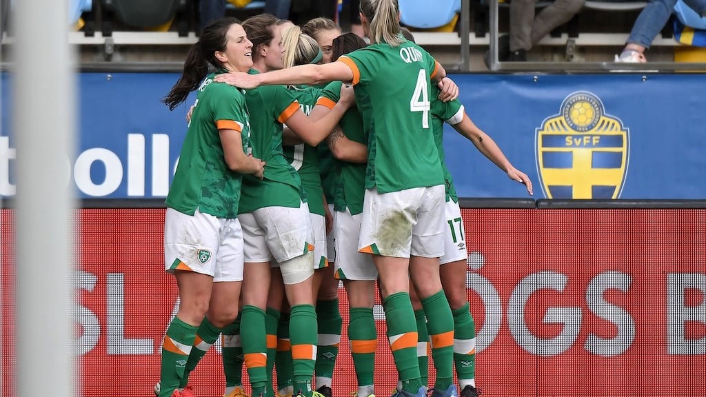 The Ireland players celebrate Katie McCabe’s opening goal. Photograph: Tommy Holl/Inpho