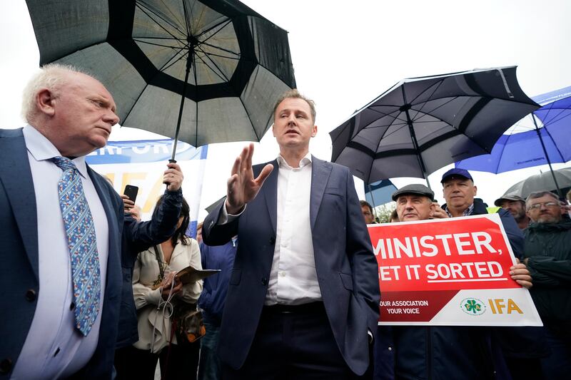 Minister for Agriculture Charlie McConalogue outside the Horse and Jockey Hotel in Co Tipperary where farmers are protesting during a Fianna Fáil event. Photograph: Niall Carson/PA Wire