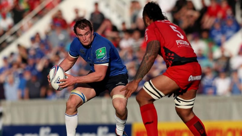 Toulon’s Jocelino Suta attempts to close down ball-carrying Rhys Ruddock of Leinster in the Heineken Cup quarter-final. Photograph: James Crombie/Inpho
