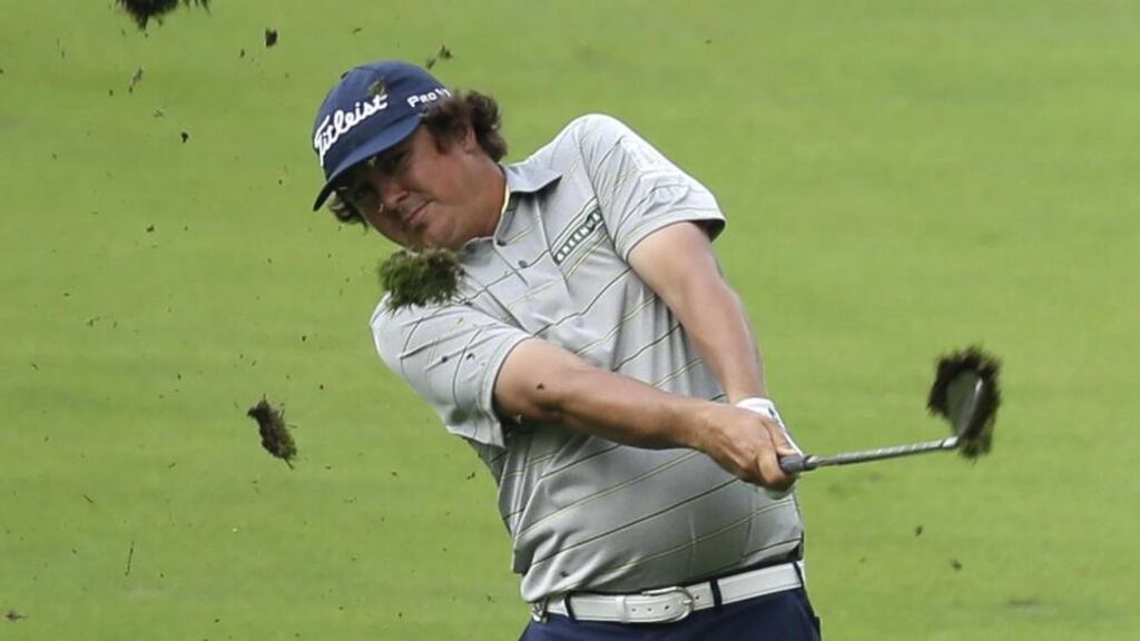 Jason Dufner hits from the fairway on the 14th hole during the second round of the PGA Championship at Oak Hill. Photograph: AP