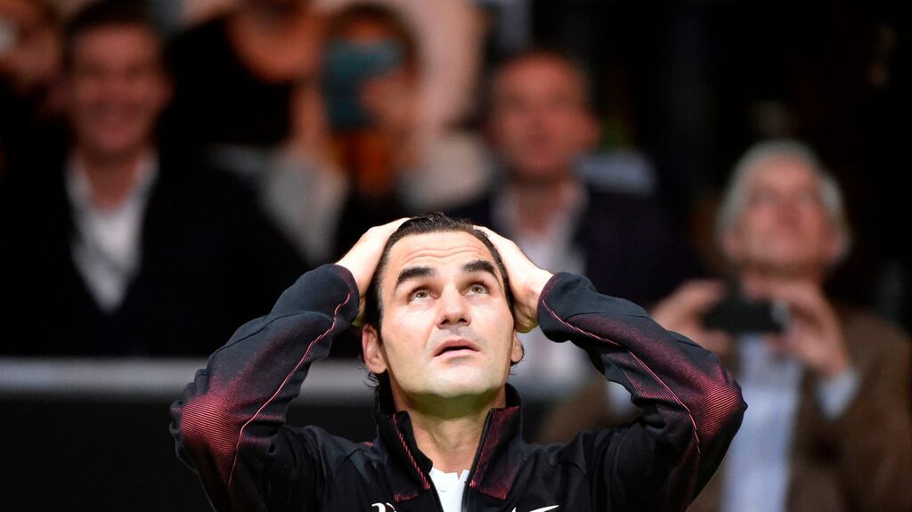 Roger Federer celebrates his victory over Robin Haase in their quarter-final singles tennis match in Rotterdam. Photograph: Getty Images
