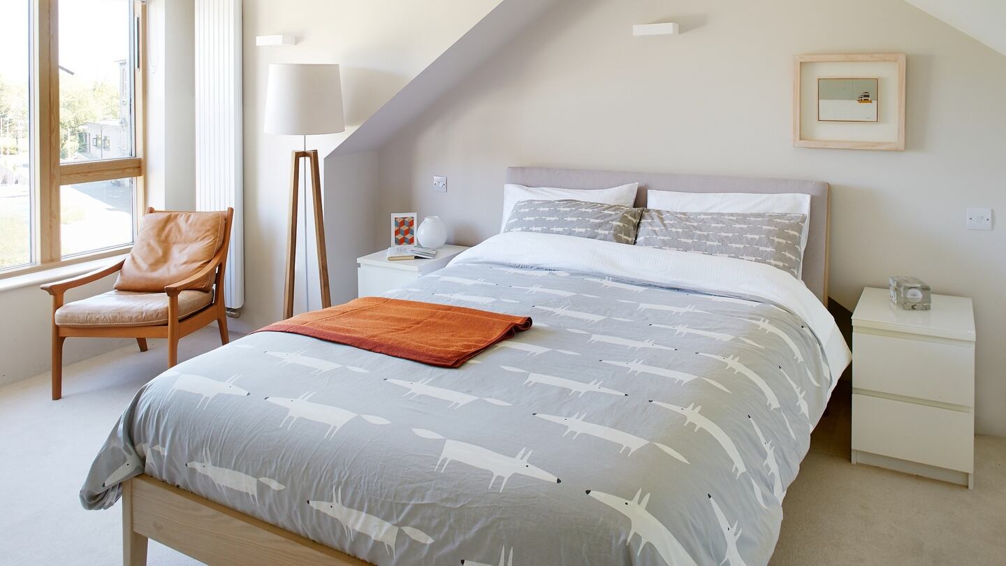 Attic space is used as  the main bedroom.