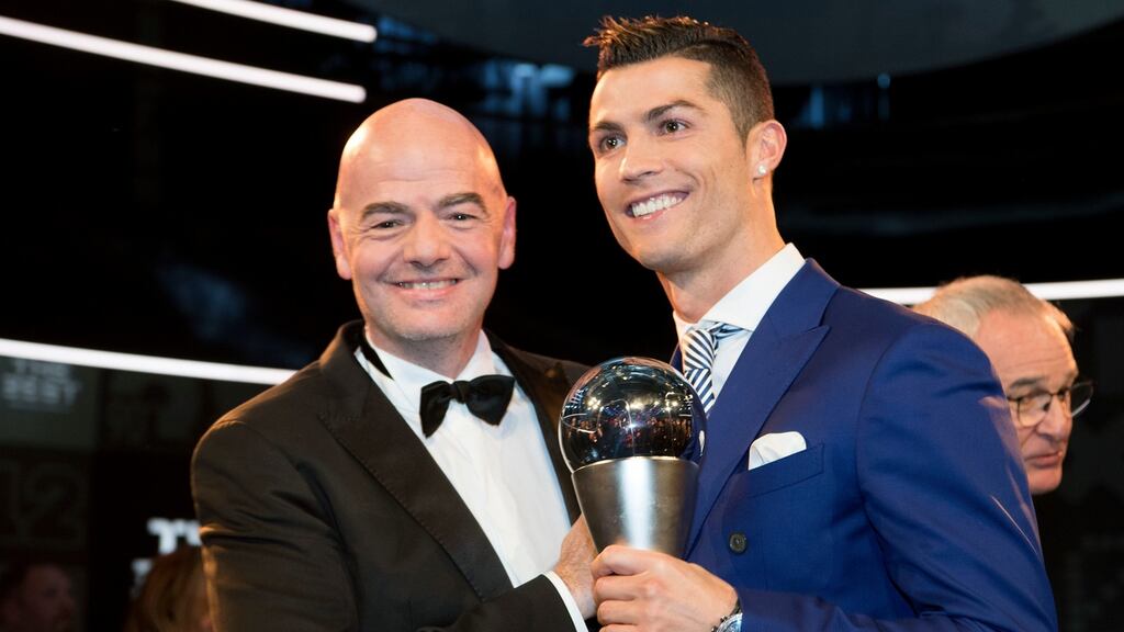 Portugal’s Cristiano Ronaldo, right, poses with FIFA President Gianni Infantino after winning The Best FIFA Men’s Player award during the The Best FIFA Football Awards 2016 held in Zurich, Switzerland. Photo: Ennio Leanza/Keystone via AP