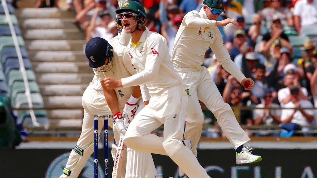 Australia’s captain Steve Smith celebrates with team mates after taking a catch to dismiss England’s captain Joe Root during the fourth day of the third Ashes cricket test match. Photograph: Reuters