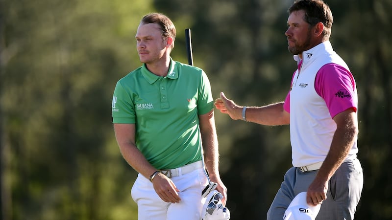 Westwood congratulates Danny Willett at the end of the final round of last year’s tournament. Photo: Harry How/Getty Images