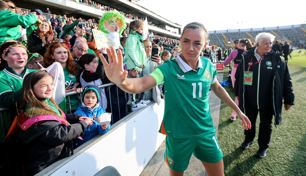 Ireland's Katie McCabe with fans after the game. Photograph: Ryan Byrne/Inpho