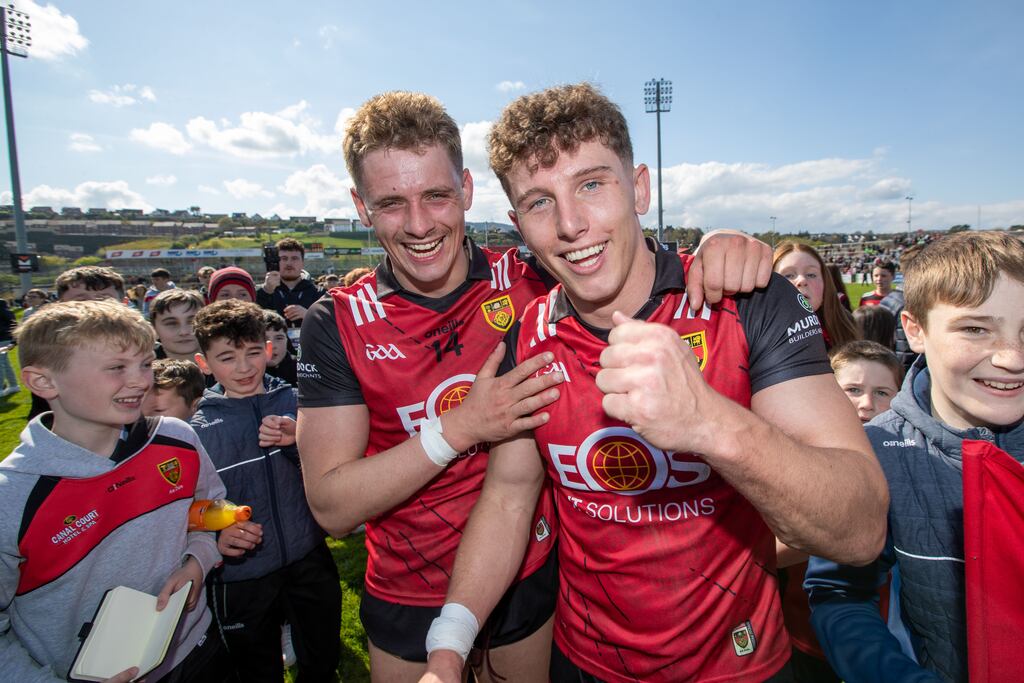 Down’s Pat Havern and Pierce Laverty celebrate victory. Photograph: Morgan Treacy/Inpho