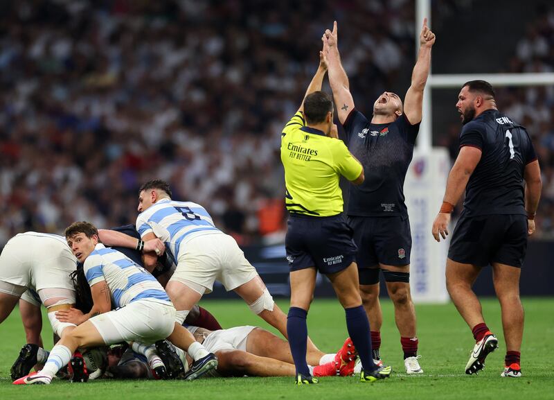 England’s Ben Earl celebrates as referee Mathieu Raynal awards a penalty during the game against Argentina. Photograph: James Crombie/Inpho