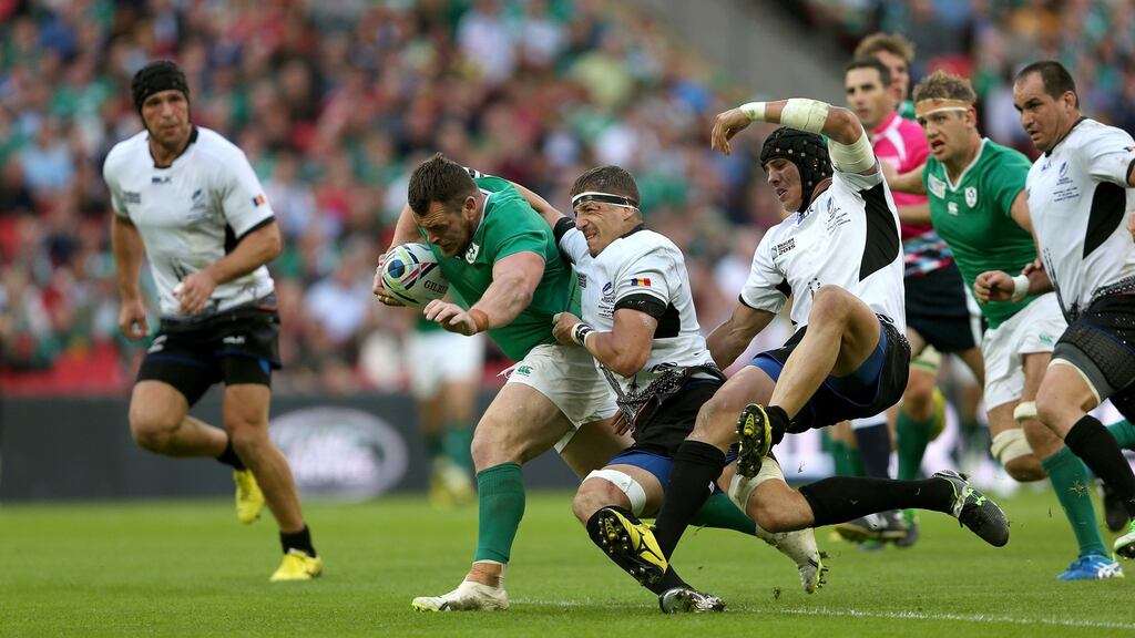Cian Healy charges through the Romania defence. Ireland went on to win 44-10. Photograph: David Davies/PA Wire