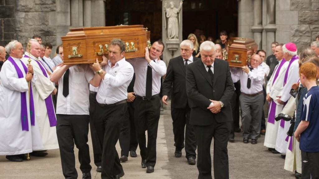 The remains of murdered brothers Tom and Jack Blaine are carried from The Church Of The Holy Rosary after funeral mass in Castlebar, Co. Mayo, by family members today. Photograph: Keith Heneghan/Phocus