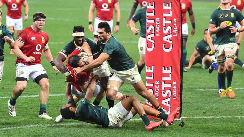 Lions centre Robbie Henshaw is tackled over the South Africa try line during the second Test in Cape Town. Photograph: Rodger Bosch/AFP via Getty Images