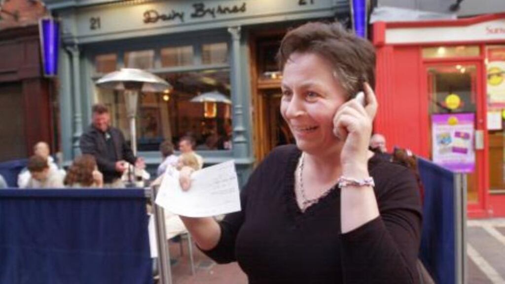 Anne Enright celebrates winning the first Davy Byrnes short story award in 2004. The author, who went on to win the Man Booker Prize in 2007 for The Gathering, is one of three judges for the 2014 award, along with 2012 Impac award winner Jon MacGregor and Yiyun Li, winner of the Guardian First Book award