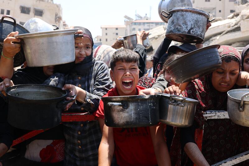 Palestinians crowd at a lentil soup distribution point in Gaza City in the northern Gaza Strip on July 27th Photograph: AFP via Getty Images